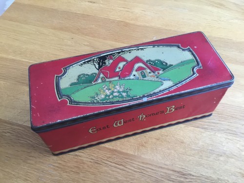 Vintage biscuit tin east - vintage, west